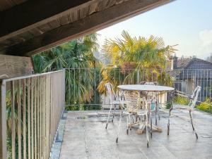 Elegant Traditional Home Steps from the Lake, with Garden and Panoramic Terrace