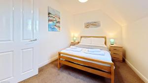 Bayside Cottage - Seaview and Balcony - Part of the The Bay Filey Holiday Village with pool, gym and direct beach access, pub, restaurant, tennis and meadows walks