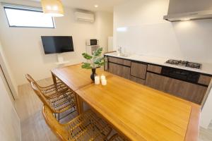 Palm Tree, built in 2025, 24 minutes to Churaumi Aquarium and 18 minutes to Jangria, A luxurious stay in the Yanbaru forest