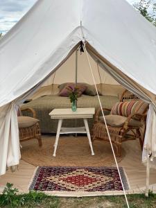 Romantic glamping in the forest near a sandy beach