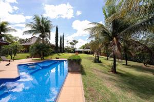 Chácara para grupos a 15 min do GP Motors | Piscina| Quiosque c Churrasqueira| Cervejeira| WiFi | Portaria 24h | Garagem para 6 carros