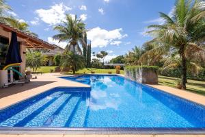 Chácara para grupos a 15 min do GP Motors | Piscina| Quiosque c Churrasqueira| Cervejeira| WiFi | Portaria 24h | Garagem para 6 carros