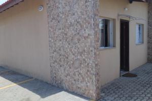 Linda casa de praia sobre as ondas - casa em condomínio com 1 vaga de garagem