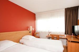 Appart'hotels Sejours & Affaires Tours Leonard De Vinci : photos des chambres