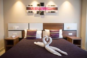 Hotels Holidays & Work HOTEL : photos des chambres