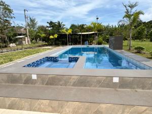 INATO SUITES Rm 1 1 queen bed and a pullout sofa bed