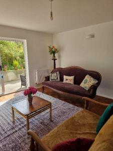 Cottage near the sea with stunning views and private woodland