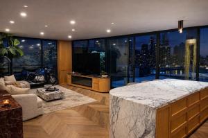 Designer Wellness Penthouse with Riverfront Terrace