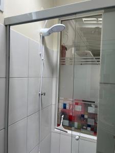 Loft a 10 min da praia com AC e estacionamento