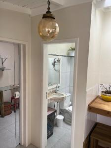 Loft a 10 min da praia com AC e estacionamento