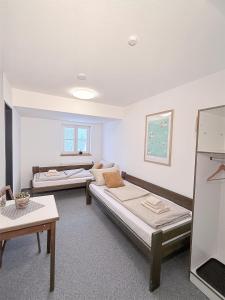 Berghaus über dem See - Herberge im Hoff Schawernack