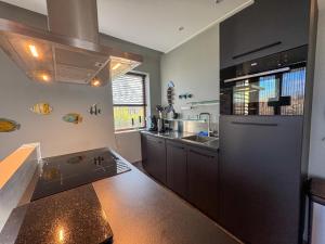 Bad Hoophuizen Chalet Deluxe mit Zaun Nr Zuiderzee 66