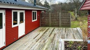 Red Wooden House With Spa Near Knudeklinterne