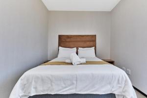 SoHo Unit 154 with Private Garden & Community Pool