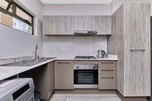 SoHo Unit 154 with Private Garden & Community Pool