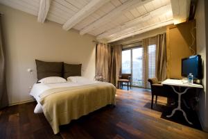 Hotels Art'Hotel & SPA Le Potin Gourmand : photos des chambres