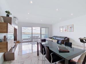 Premium Seafront Apartment with Panoramic Bay Views