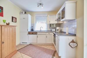 Haus Inselherz - Ferienwohnung Muschel