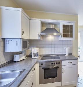 Haus Inselherz - Ferienwohnung Muschel