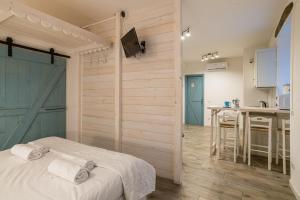 GuestHost - La Filanda Apartments - Sora & Sota