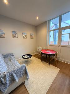 T3-58m2-neuf-2ch-Balcon-centre-10 min-plage