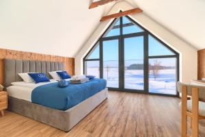 "Wioska Wakacyjna Glamila" Mazury, nad jeziorem, podgrzewany basen, Glamping i domki rodzinne