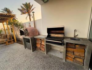 Relájate en piscina-spa, terraza BBQ y AC Paracas