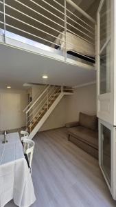 LOFT in Historic Convent with Balcony & Patio View