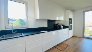 Duplex neuf centre ville, à 5 minutes de la plage!