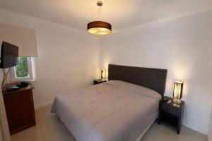 Apartment in Solanas with backyard