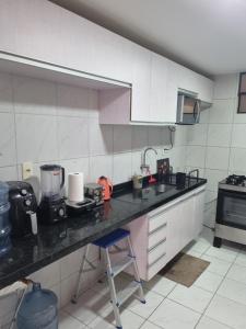 Suíte completa e poucos metros da praia