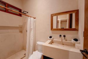 Stylish 1BR Retreat in Holistika with Private Pool