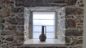 MENELAUS Stone House