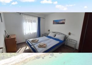 Apartmani Maslina Vir