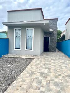 Casa da Cle, 2 quartos, ar condicionado, 600m da praia