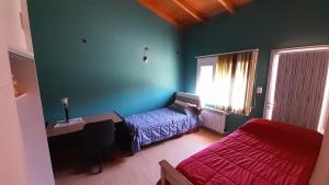 Casa Familiar en barrio tranquilo con Parrilla y Cochera