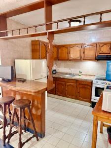 3 bedroom house one short walk from the beach