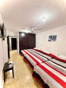 3 bedroom house one short walk from the beach