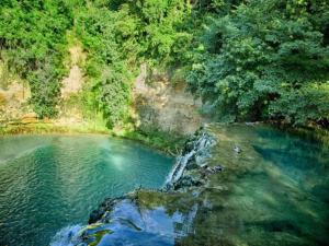 Apartment in a farmhouse with swimming pool