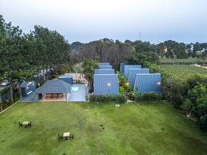 Alaya stays Inara Retreat Pet-Friendly 1-Cottage with a Mezzanine Loft, Shared Pool, and Garden