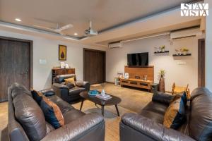 StayVista at Brickhouse Aranya with Pool and Farm View