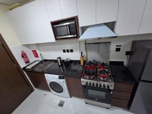 Wavez 06 Well Furnished Studio in Liwan