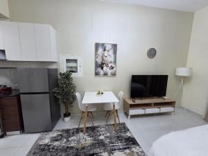 Wavez 06 Well Furnished Studio in Liwan