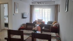 The comfort executive loft three bedroom apartment with amazing breathtaking city views , swimming pool ,gym ,private ample parking space with designated child playground are