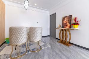 modern serenity suites apartments with swimming pool,modern equipped gym,private parking space, children playing ground, proximity to major shopping malls and unbeatable city views