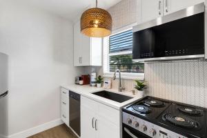 Beach Condo With Heated Pool & Fishing Dock - Steps to Sand - Coral Resort D-1