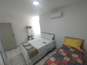 Quarto aconchegante e funcional perto da rodoviária Hospital do Câncer Pátio de eventos e universidades ótima localização