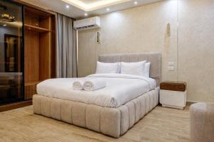 Sheraton 2BDR Metropolitan 5 mins to CAI Airport