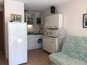 Location T2 Gruissan : Piscine, Parking, Clim, Proche Plage - Idéal Famille - FR-1-796-1