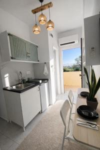 Olive Studio ,Balcony with Mountain View, Kitchenette, 1km to Beach ,by likeyourhome